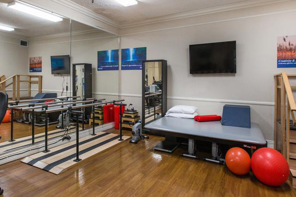 Rehab room with exercise equipment at Montebello Care Center